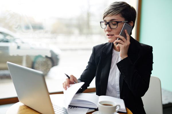 a woman talkng on the phone